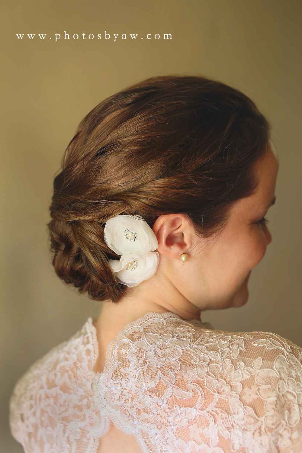wedding_updo_with_flowers_lace_dress