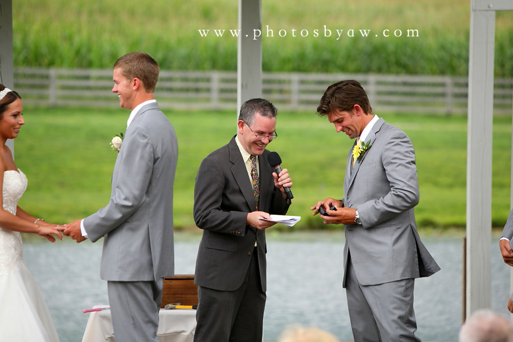 best_man_has_wedding_rings_outdoor_ceremony