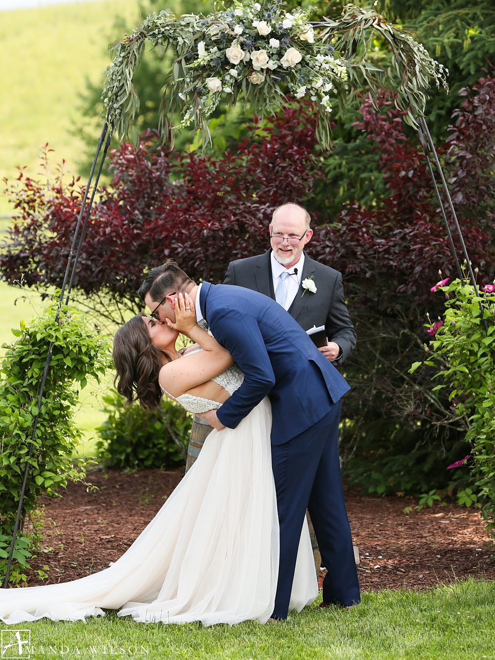 ceremony_kiss_armstrong_farms_fieldstone